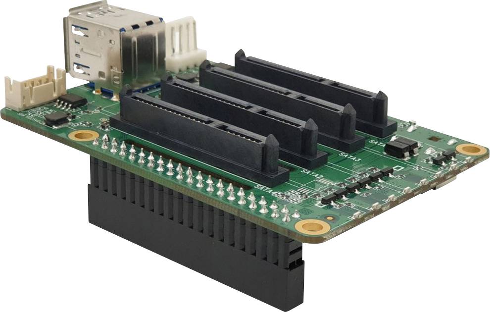 Ett grönt kretskort med USB-portar och flera expansionsplatser, använt i datorer eller elektronisk utrustning.