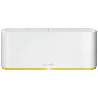 Vit Somfy-box med gul bas, rektangulär form, central knapp, avsedd för styrning av smarta hemmasystem.