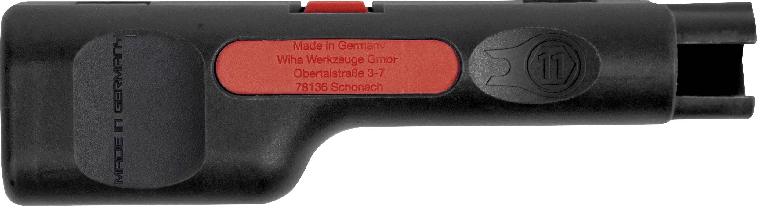 Ett svart plastverktyg med röd insats, där texten 'Made in Germany' och en adress finns tryckt, som används för skruvarbeten.