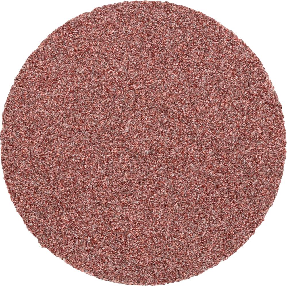 En oval, röd matta med grov, texturerad yta ligger plant på golvet.