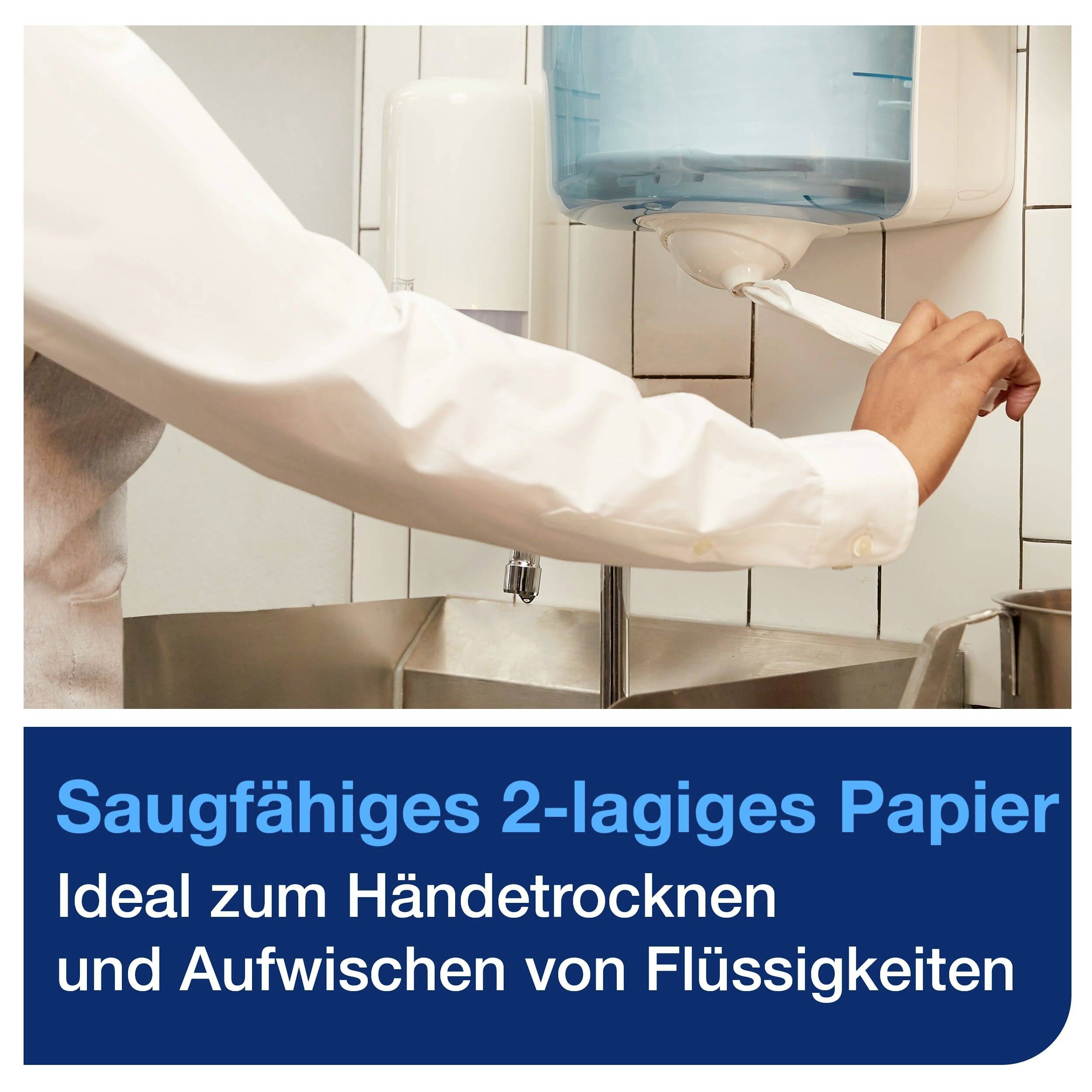 En person drar ut papper från en dispenserare. Text: 'Absorberande 2-skiktat papper. Perfekt för handtorkning och uppsamling av vätskor.'