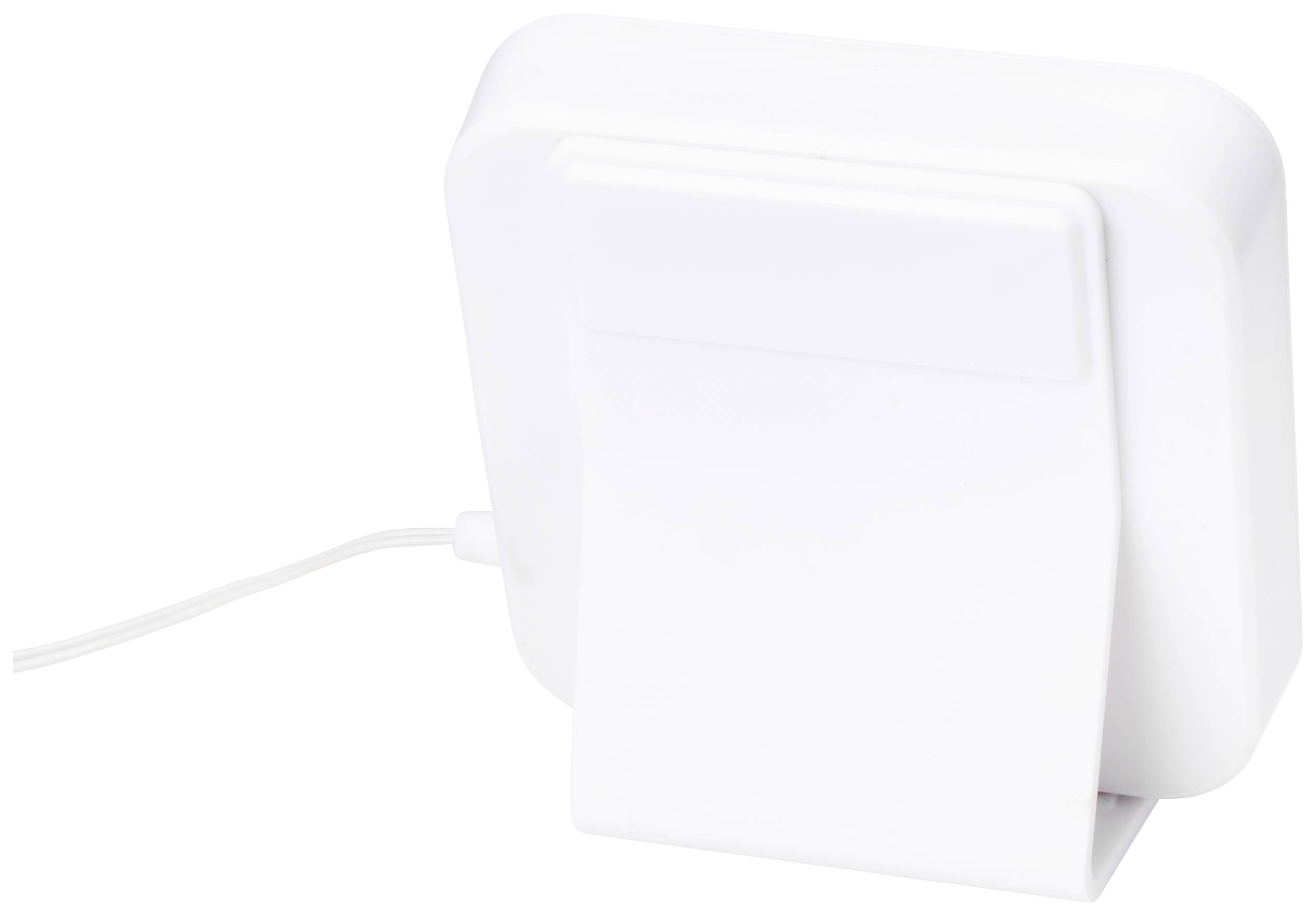 En vit, fyrkantig elektronisk apparat med en sladd, troligen en laddare eller en liten hushållsapparat.