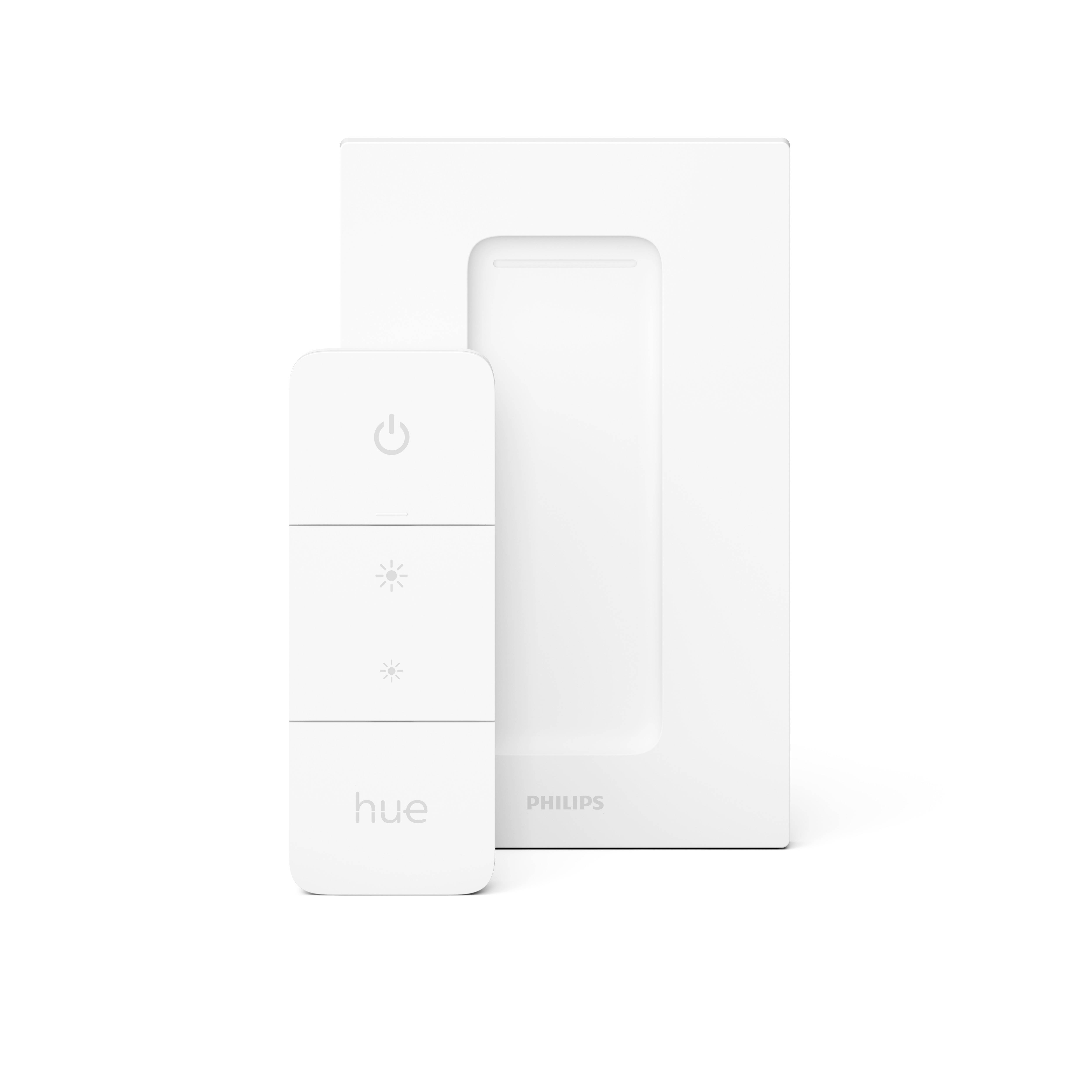Vit Philips Hue-fjärrkontroll med på-/av-knapp och två ljushetsknappar, bredvid förpackningen.