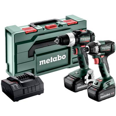 Metabo trådlös borrmaskin och slagskruvdragare med batteriladdare och grön bärväska.
