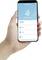 En hand håller en smartphone med en app för rörelsesensorn öppen. Alternativen på skärmen är 'Record', 'Smart' och 'Set'.