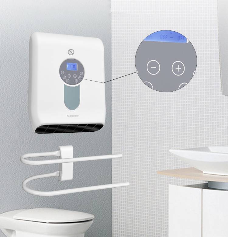 Elektrisk badrumsvärmefläkt monterad på väggen med närbild av temperatur- och effektreglage.