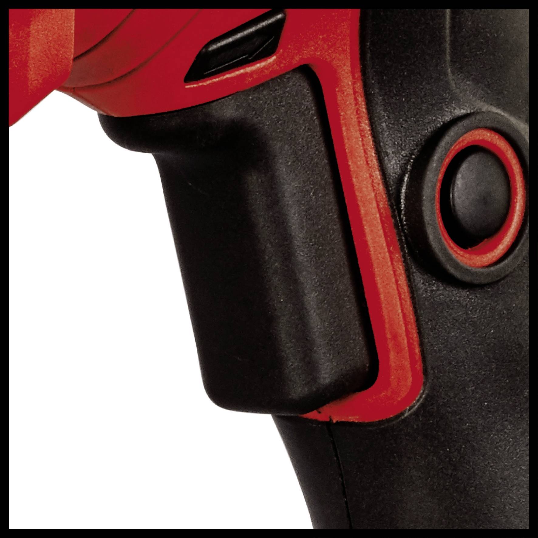 Närbild av ett borrmaskinshandtag med avtryckare, designat i svart och rött, med ergonomisk utformning för bekvämt grepp.
