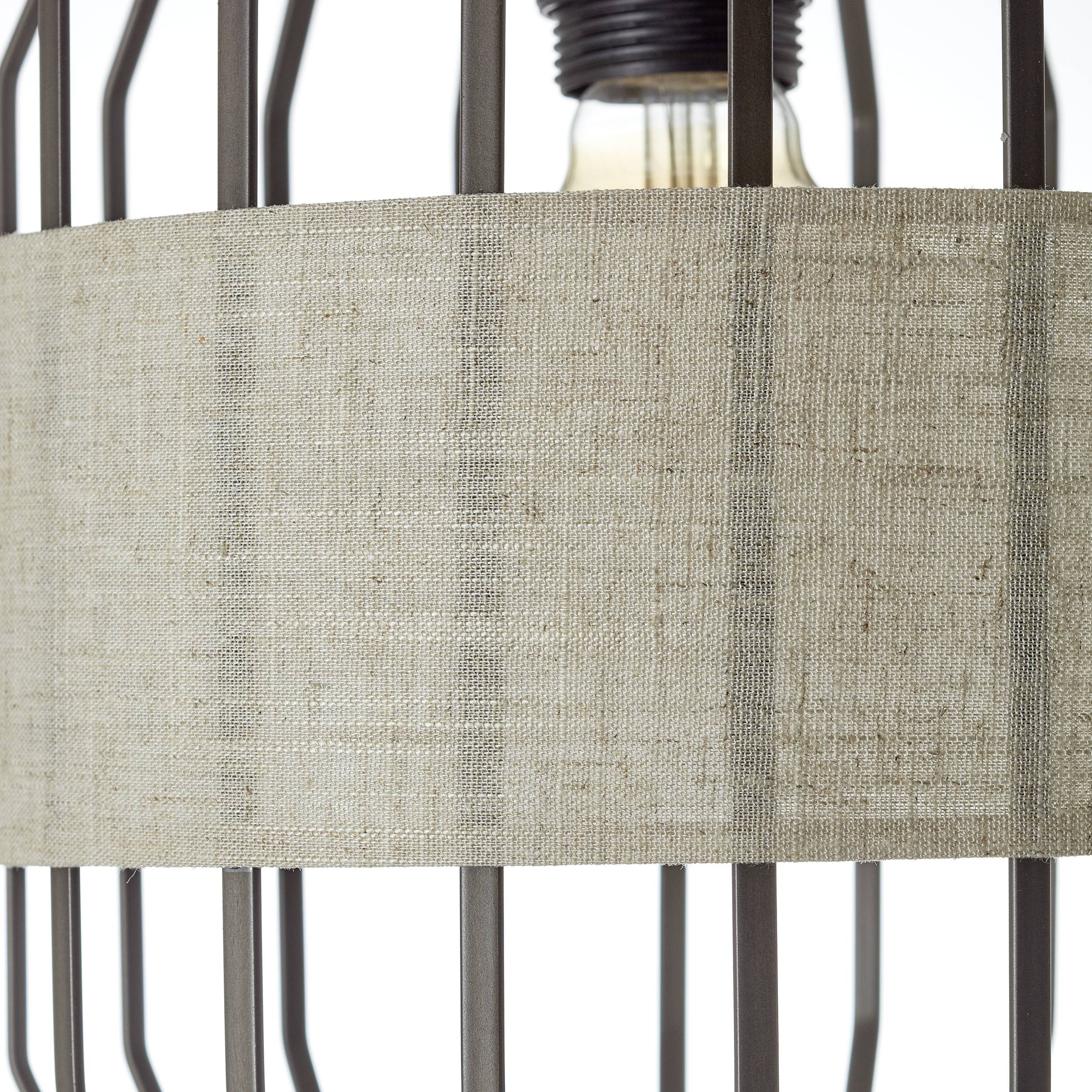 En bur med ett ljust tygband runt midjan. I bakgrunden syns en glödlampa. Minimalistisk design.