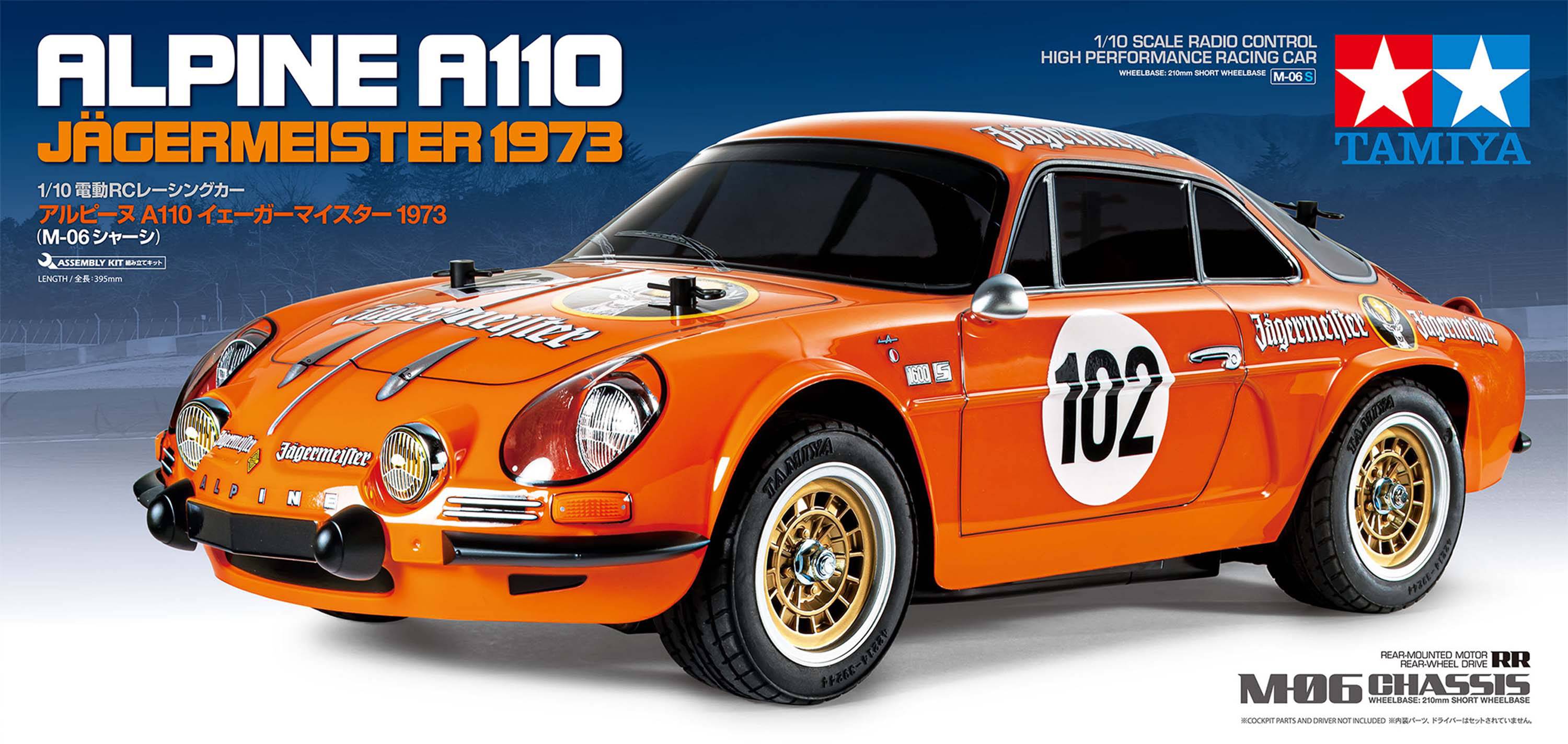 En orangefärgad modellbil av Alpine A110 med texten 'Jägermeister 1973' och nummer 102 på dörren.