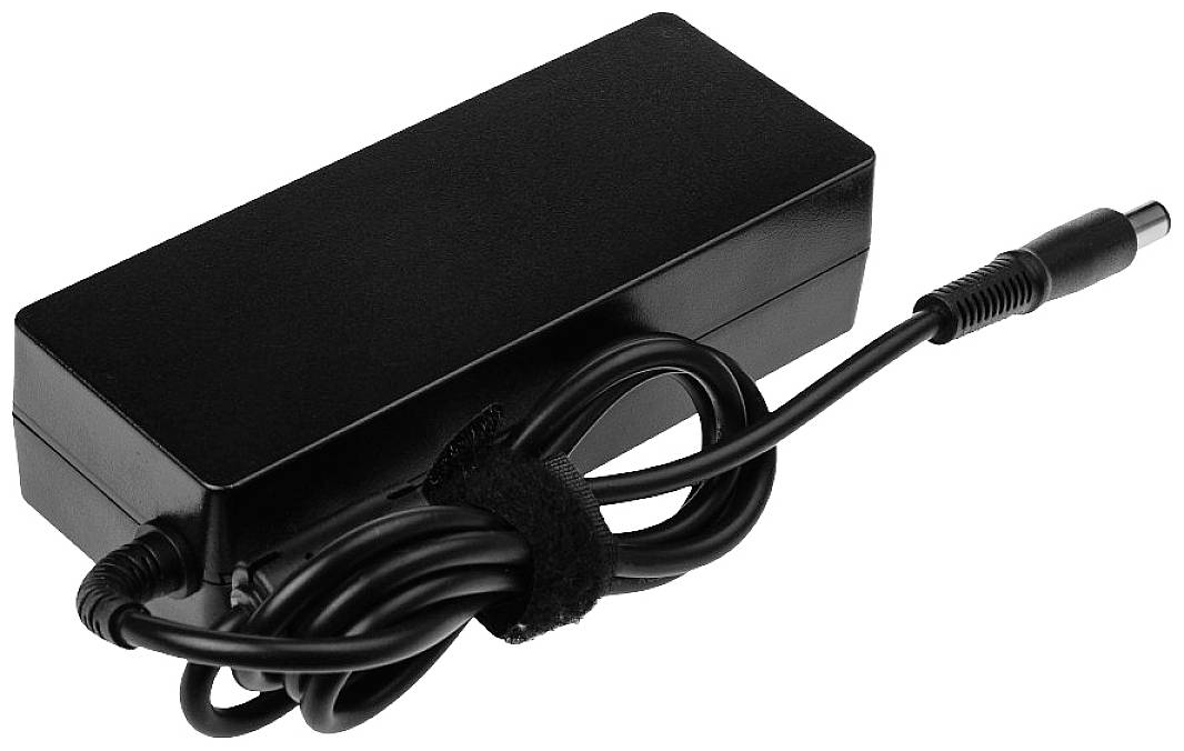 En svart bärbar datorladdare med anslutet kabel. Kabeln är upprullad och säkrad med ett kardborreband.
