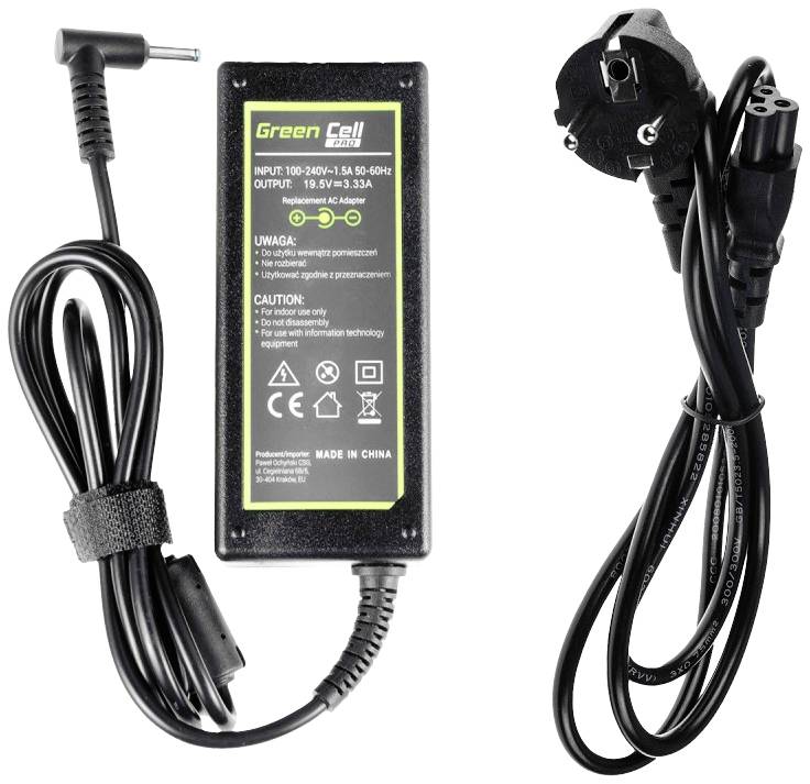 Bärbar dators nätadapter med svart kabel och europeisk kontakttyp. Klistermärke med tekniska specifikationer och varningsanvisningar synligt.