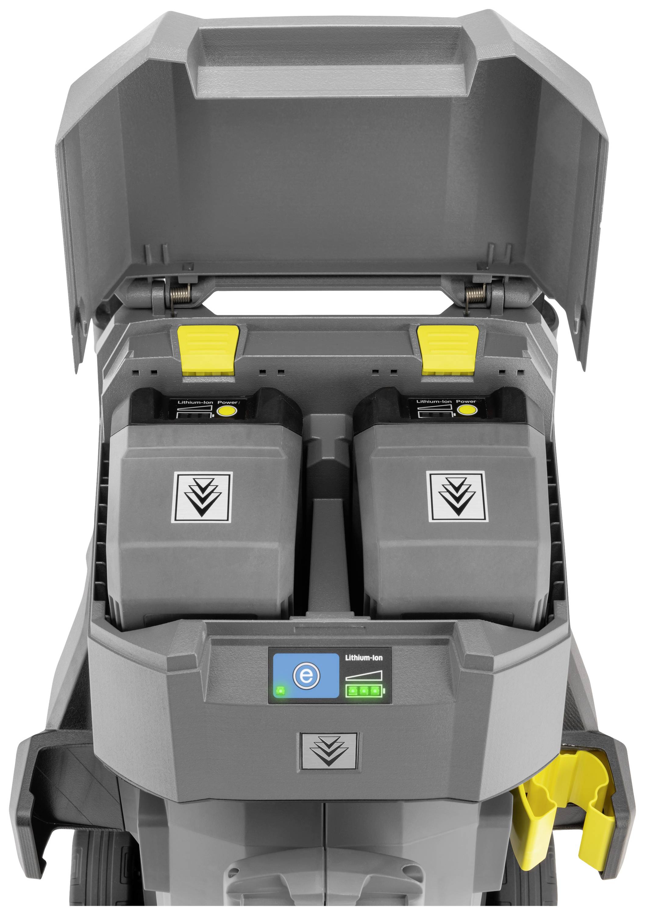 En enhet med två batterifack. En skärm visar symboler och batteristatus. Ovanpå finns ett öppet lock.