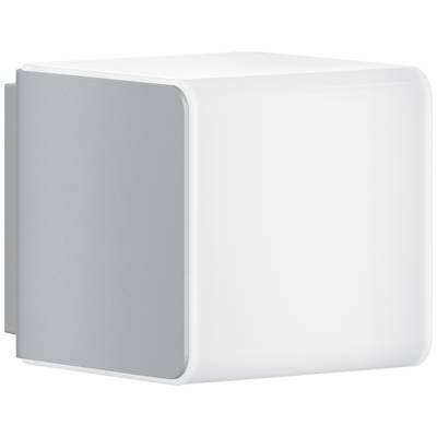 Vägglampa i kubisk form med grå sidoyta och vitt upplyst front. Modernt design, lämplig för inomhusbelysning.
