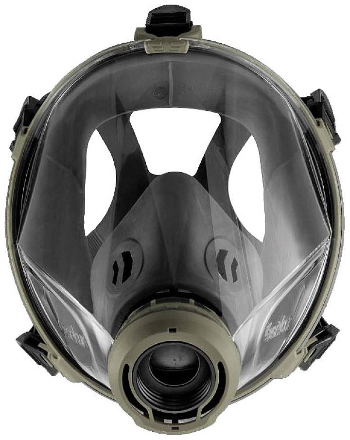 En gasmask, fotograferad framifrån, visar detaljer av andningsventiler och skyddsglas, och är avsedd att skydda mot föroreningar i luften.