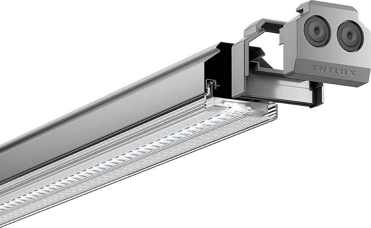En silverfärgad LED-slinga med en sensor på ovansidan, lämplig för inomhusbelysning. Sensorn kan användas för ljusstyrning.