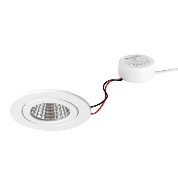 En rund, vit LED-infälld spotlight med synliga ledningar och en liten, rund vit transformator bredvid.