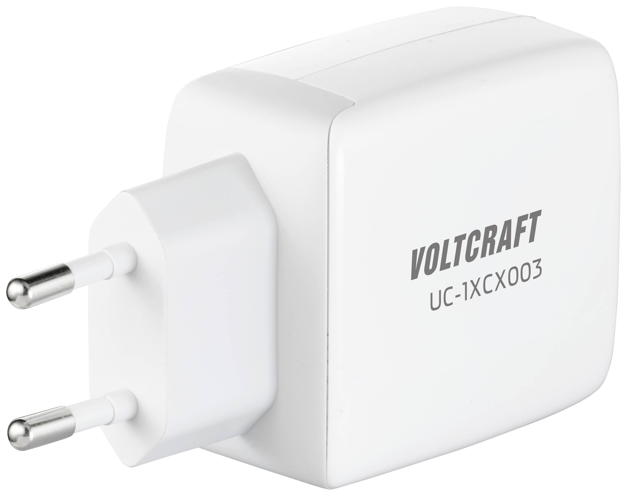 Vitt laddare med EU-kontakt; märkt med 'Voltcraft' och modellnummer 'UC-1XCX003'.