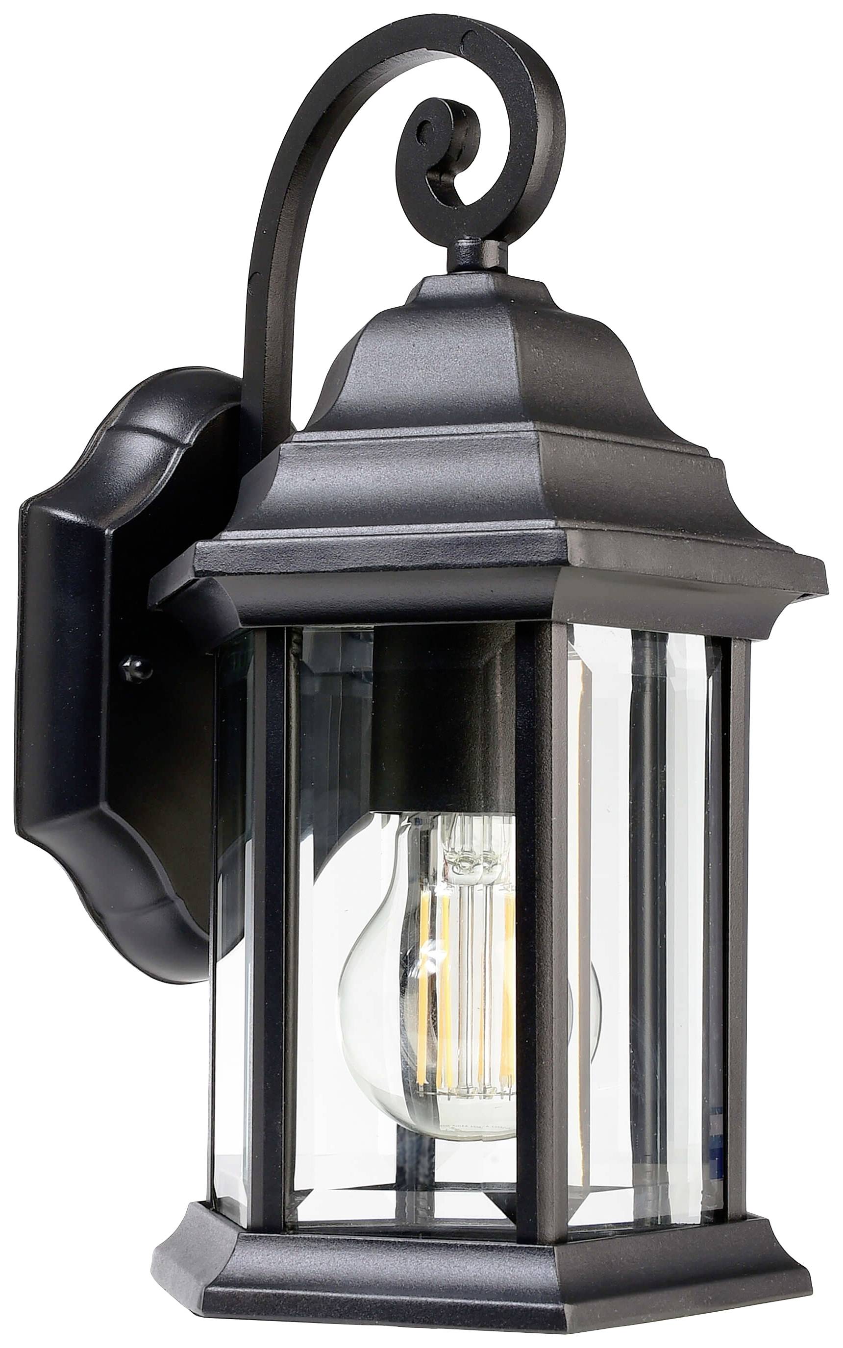 Svart, sexkantig utomhusvägglampa med klart glas och synlig glödlampa, i klassisk stil. Perfekt för entréområden.