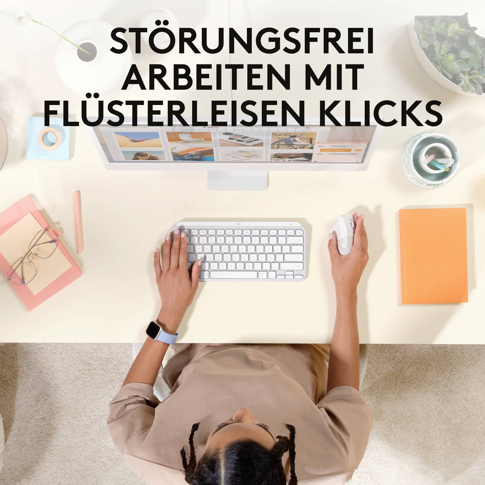 En person arbetar vid datorn i ett modernt kontor. Överst står det: 'Arbeta störningsfritt med viskande tysta klick'.