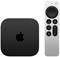 Svart Set-top-box med Apple-logotyp och silverfärgad fjärrkontroll med pekskärm och knappar för volym, meny och uppspelning.