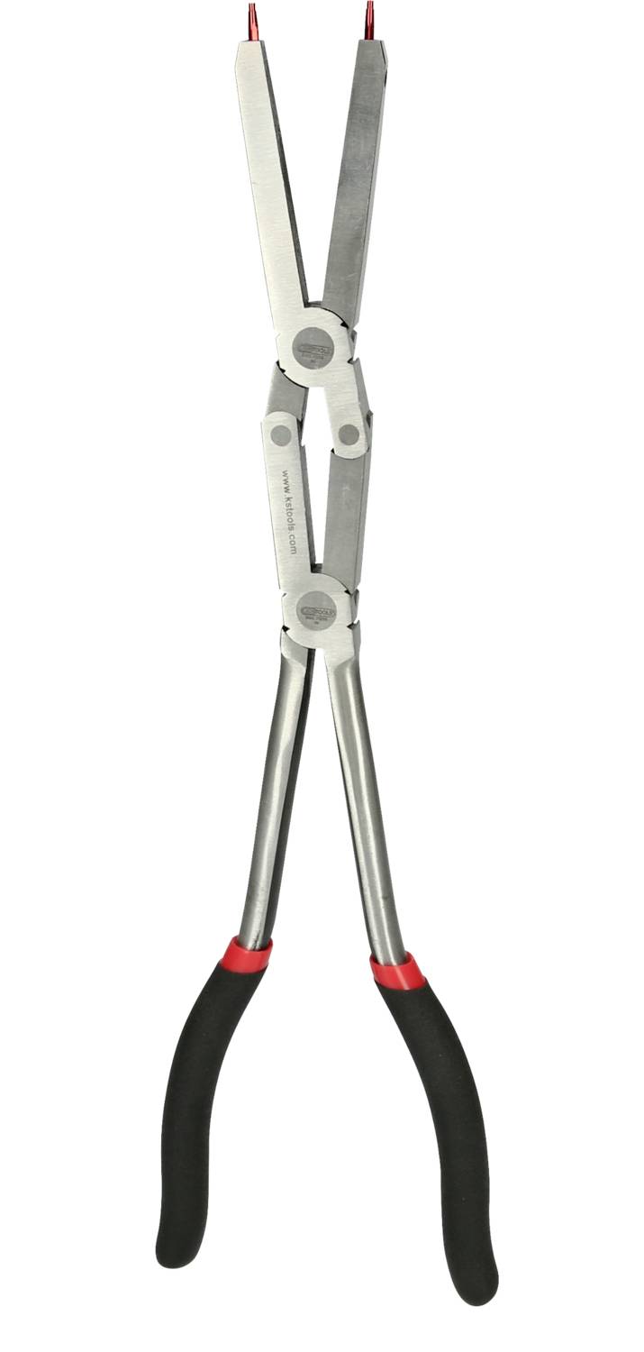 En lång professionell sax med röda handtag, lämplig för klippning av tunga material. Den har långa blad och ergonomiska handtag.