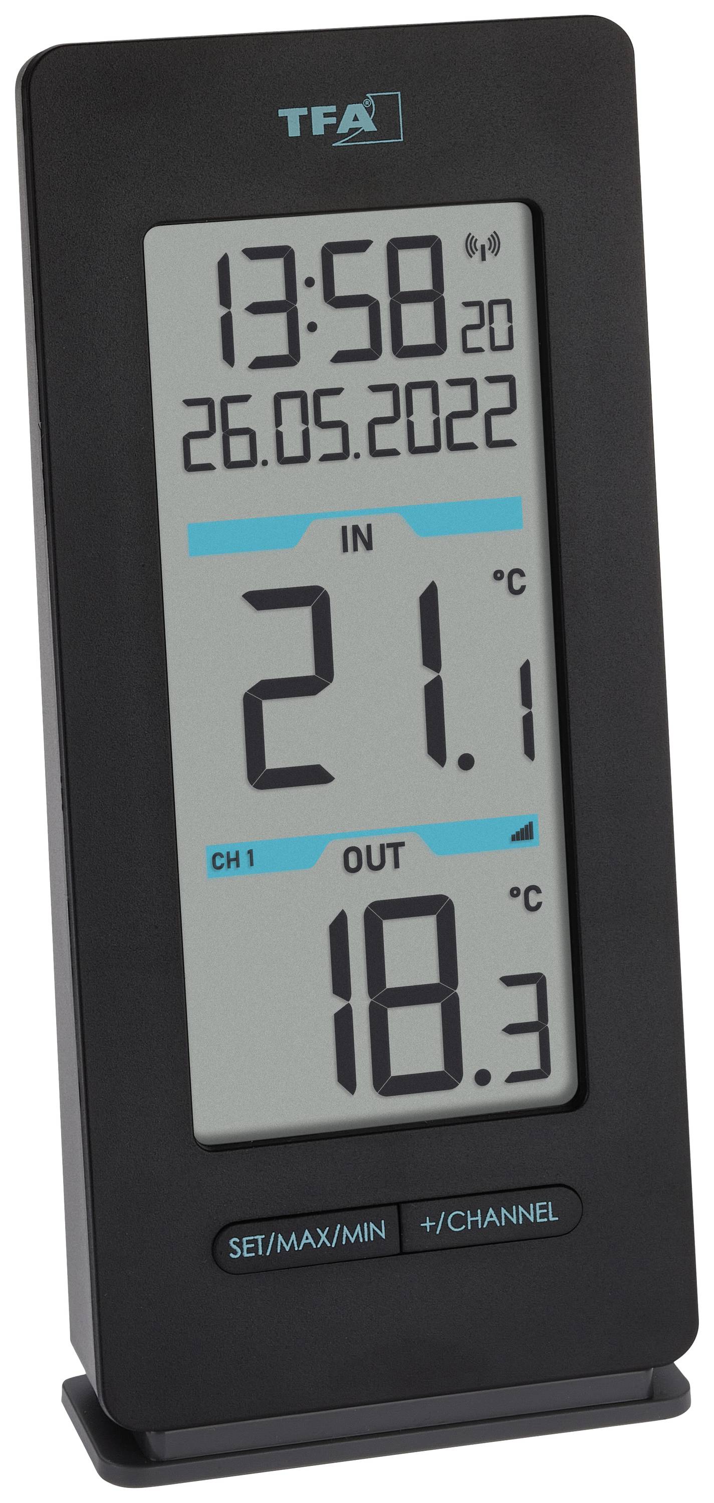 Digitalt termometer med display visar 13:58, datum 26.05.2022. Inomhustemperatur: 21,1°C. Utomhustemperatur: 18,3°C.