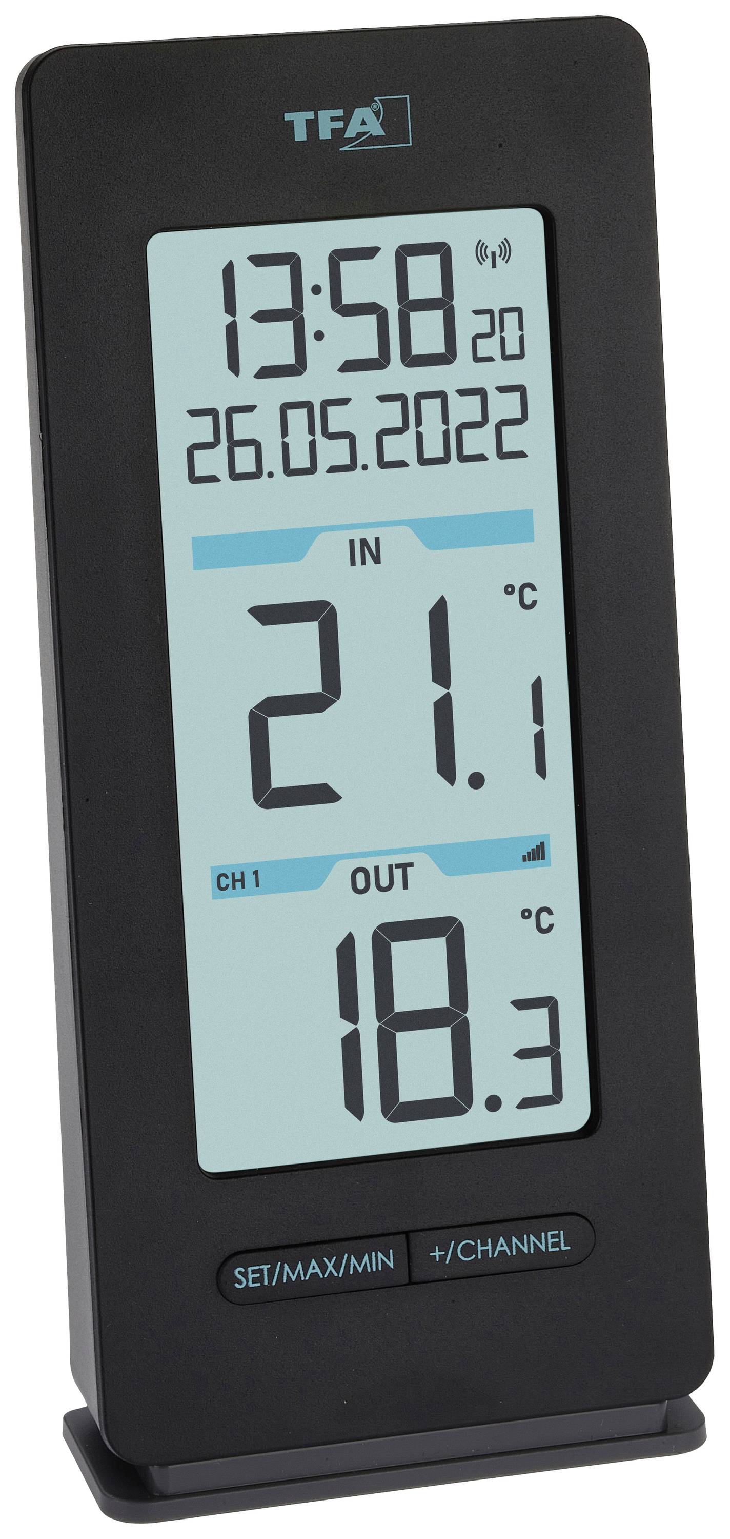 Digitalt termometer visar datum '26.05.2022', inomhus- och utomhustemperatur: Inomhus 21,1°C, Utomhus 18,3°C. Tid 13:58.