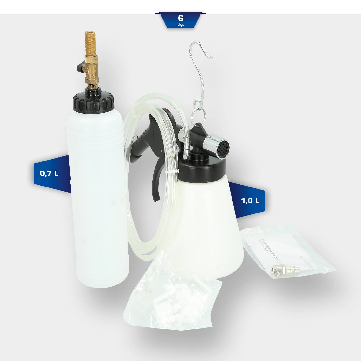 Bromsuftningsapparat med två flaskor, slangar och tillbehör för bromservice. Volym: 0,7 och 1,0 liter.