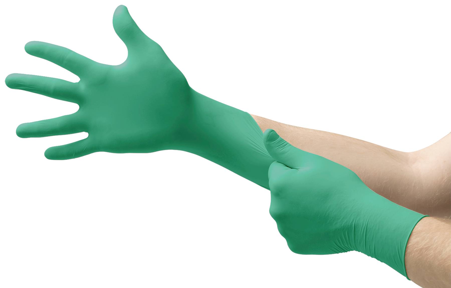Två händer tar på sig gröna medicinska handskar. Handsken till vänster dras över handen med höger hand.