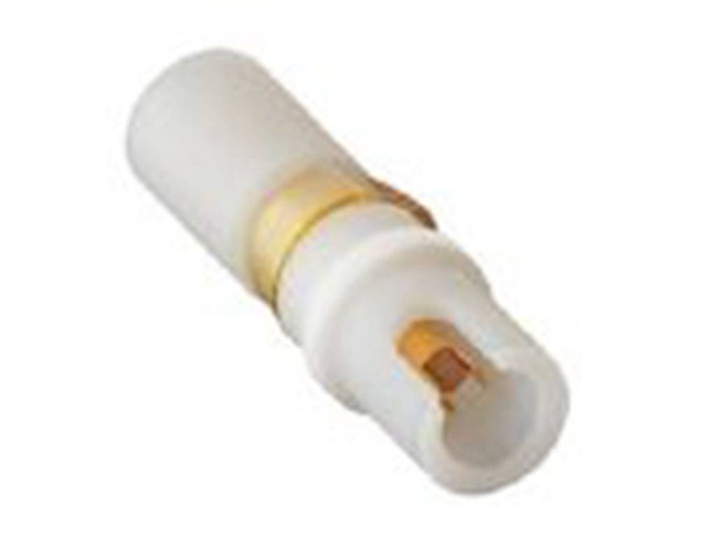En vit plastpropp med gula och kopparfärgade element som används i elektriska tillämpningar.