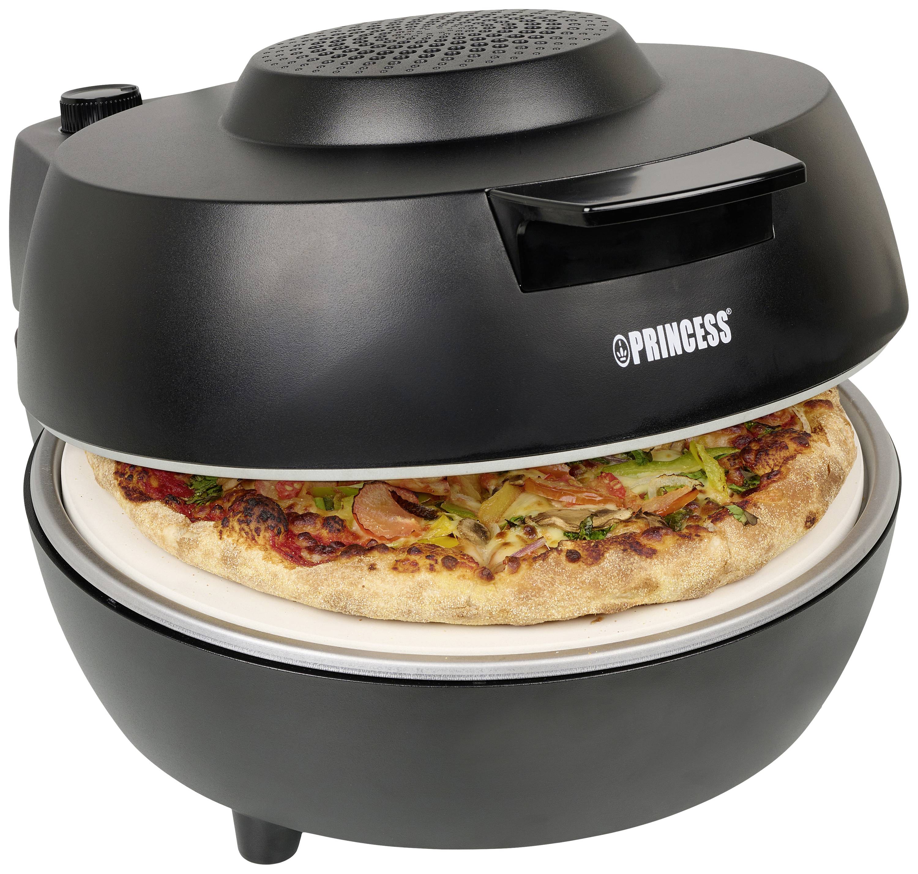 Svart pizzaugn med öppen lucka visar en nybakad pizza med grönsakstopping.