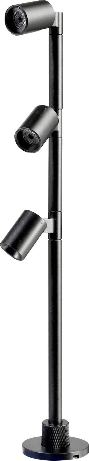 En modern golvlampa med tre justerbara, silvermetalliska strålkastare vertikalt placerade. Lämplig för riktad belysning.