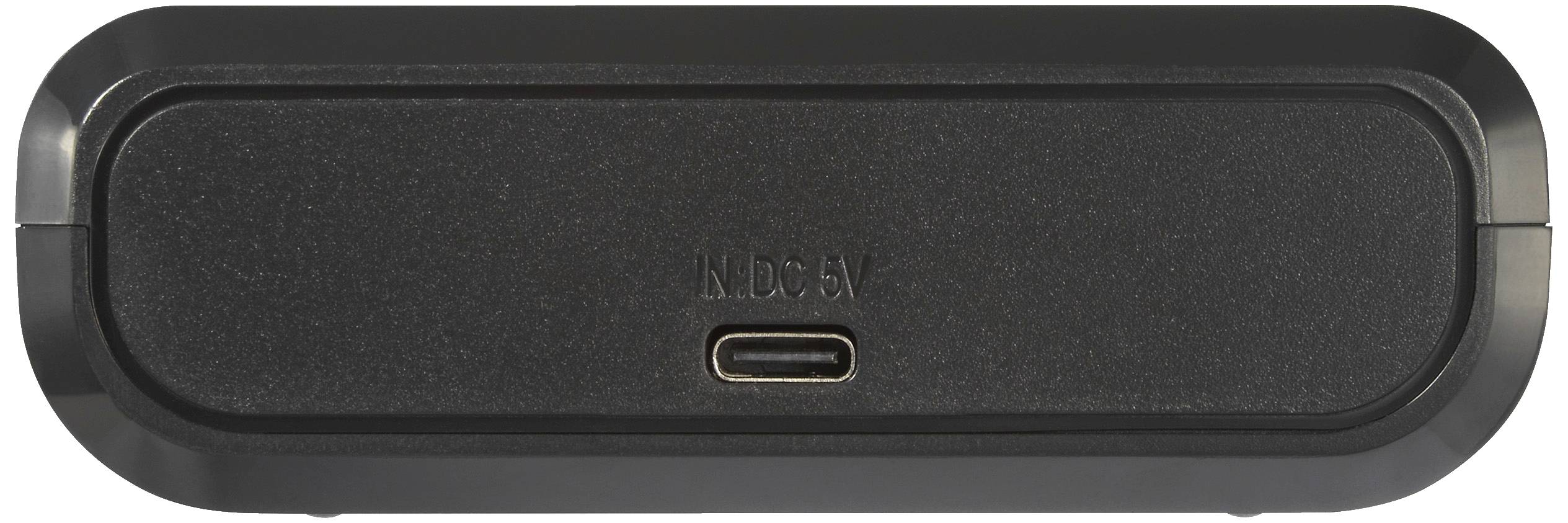 En rektangulär, svart högtalare ser tunn ut, med en USB-C-port i mitten och texten 'IN DC 5V' ovanför.
