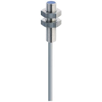 En cylindrisk approximationssensor av metall med räfflat hölje och en kabel under.