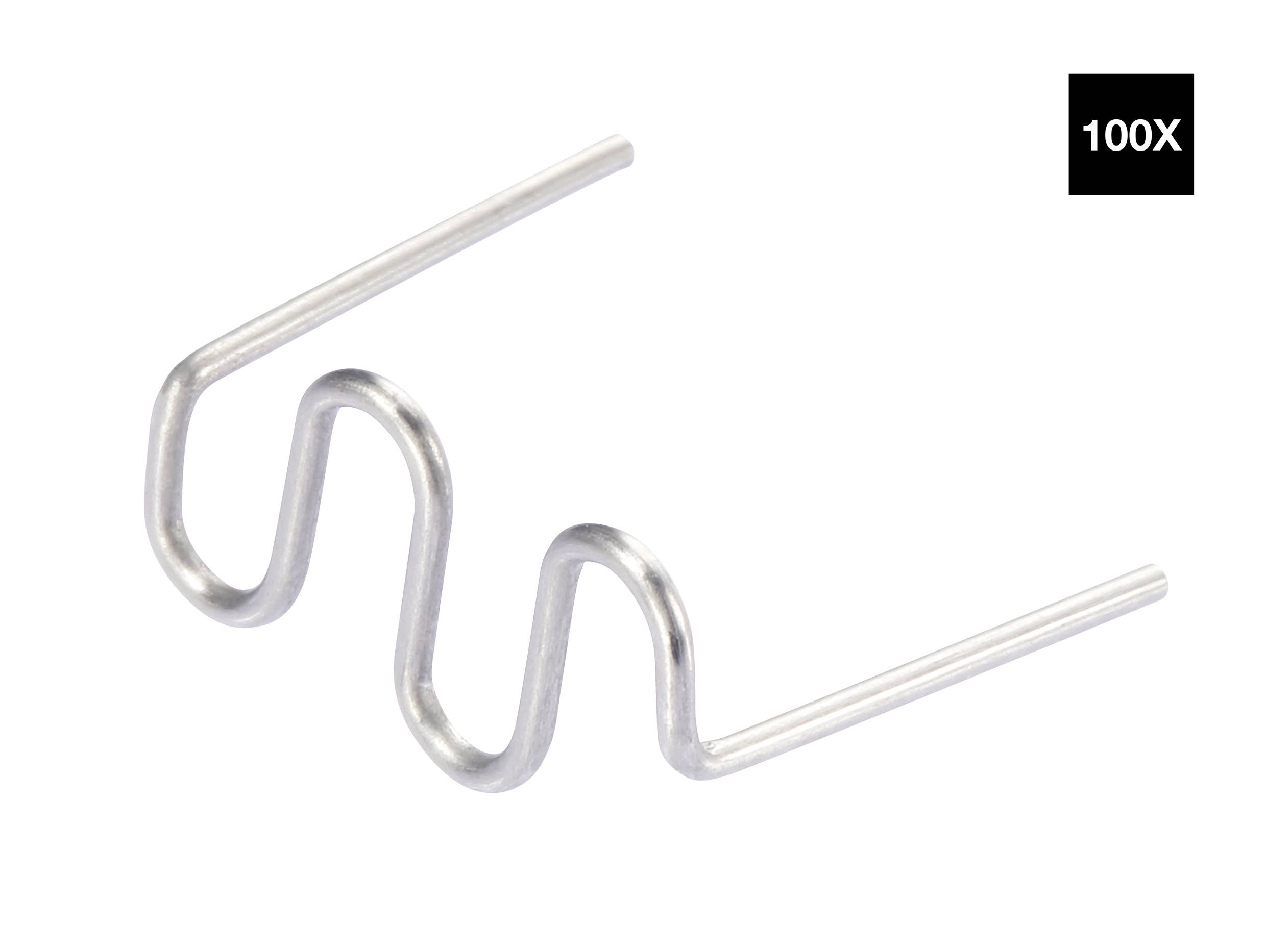 Metallisk spiralfjäder böjd i zickzackform, med en zoomfaktor på 100X i övre högra hörnet.