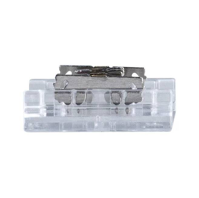 Metallskärvor på ett genomskinligt plastställ, sannolikt en del av en apparat eller ett verktyg.
