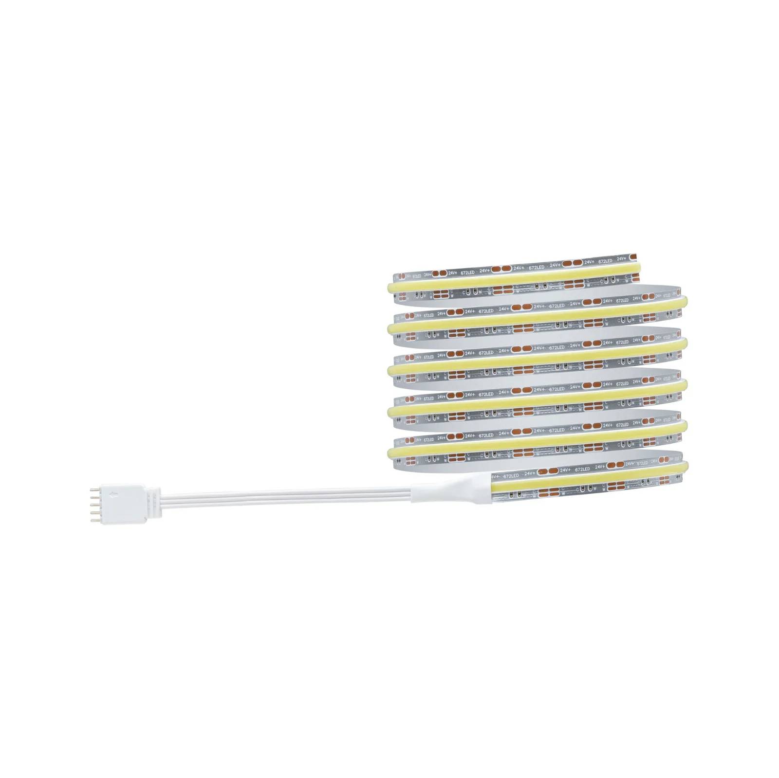 En upprullad LED-ljusslinga med anslutningskabel visar flera lysdioder med jämna mellanrum på ett flexibelt band.