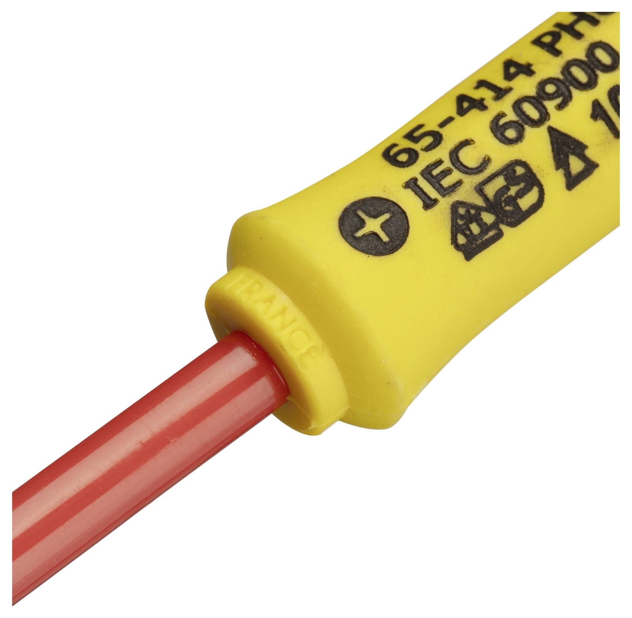 Gul elektrisk komponent med rött kabel, tryckt med 'IEC 60900' och andra tekniska upplysningar.