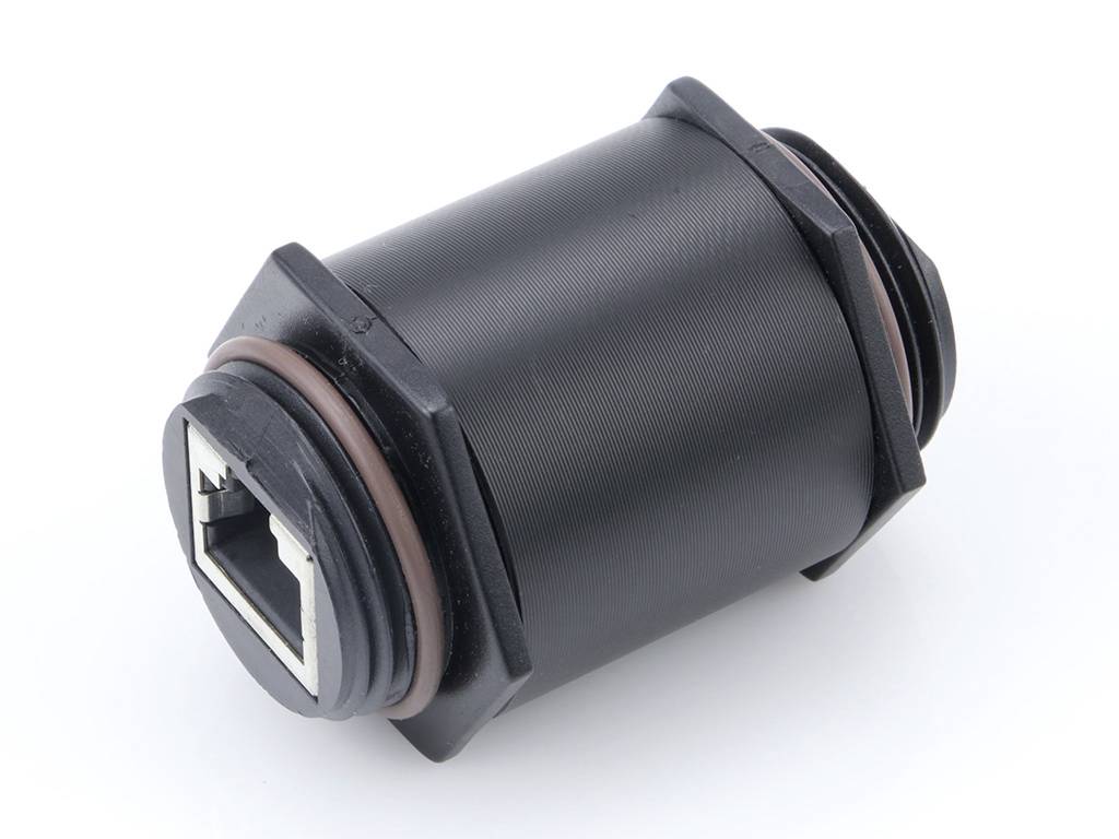 Svart cylindrisk adapter med RJ-45 nätverksanslutning i ena änden, avsedd för användning i elektroniska tillämpningar för anslutningar.