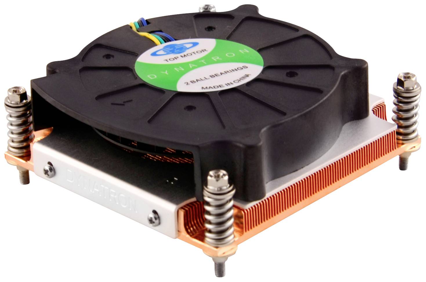 Platt fläkt med kopparfäste, svarta vingar och grön klistermärke, monterad på en metallplatta med spiralfjäderskruvar.