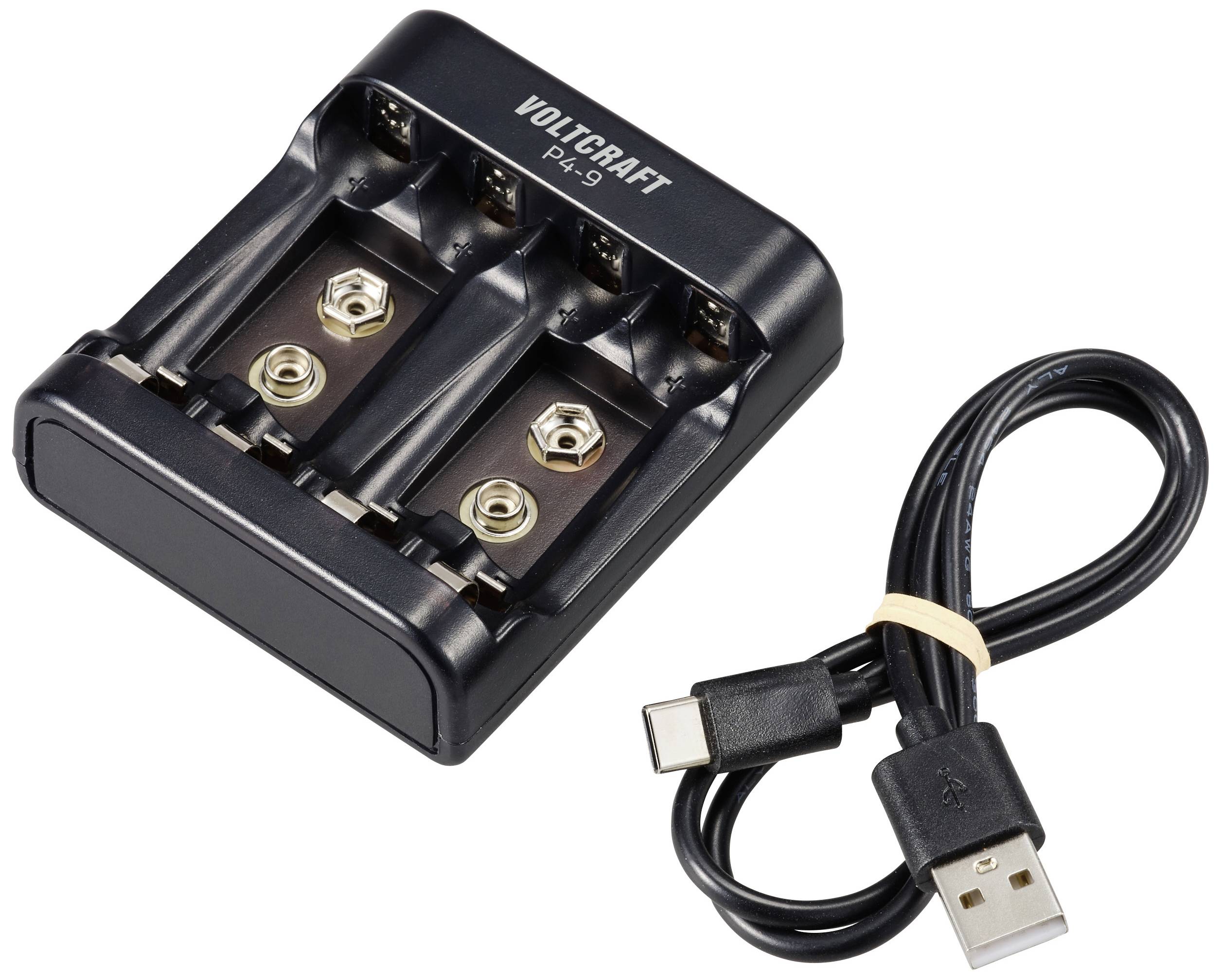 Ett laddningsaggregat för 9V-batterier bredvid en USB-kabel.
