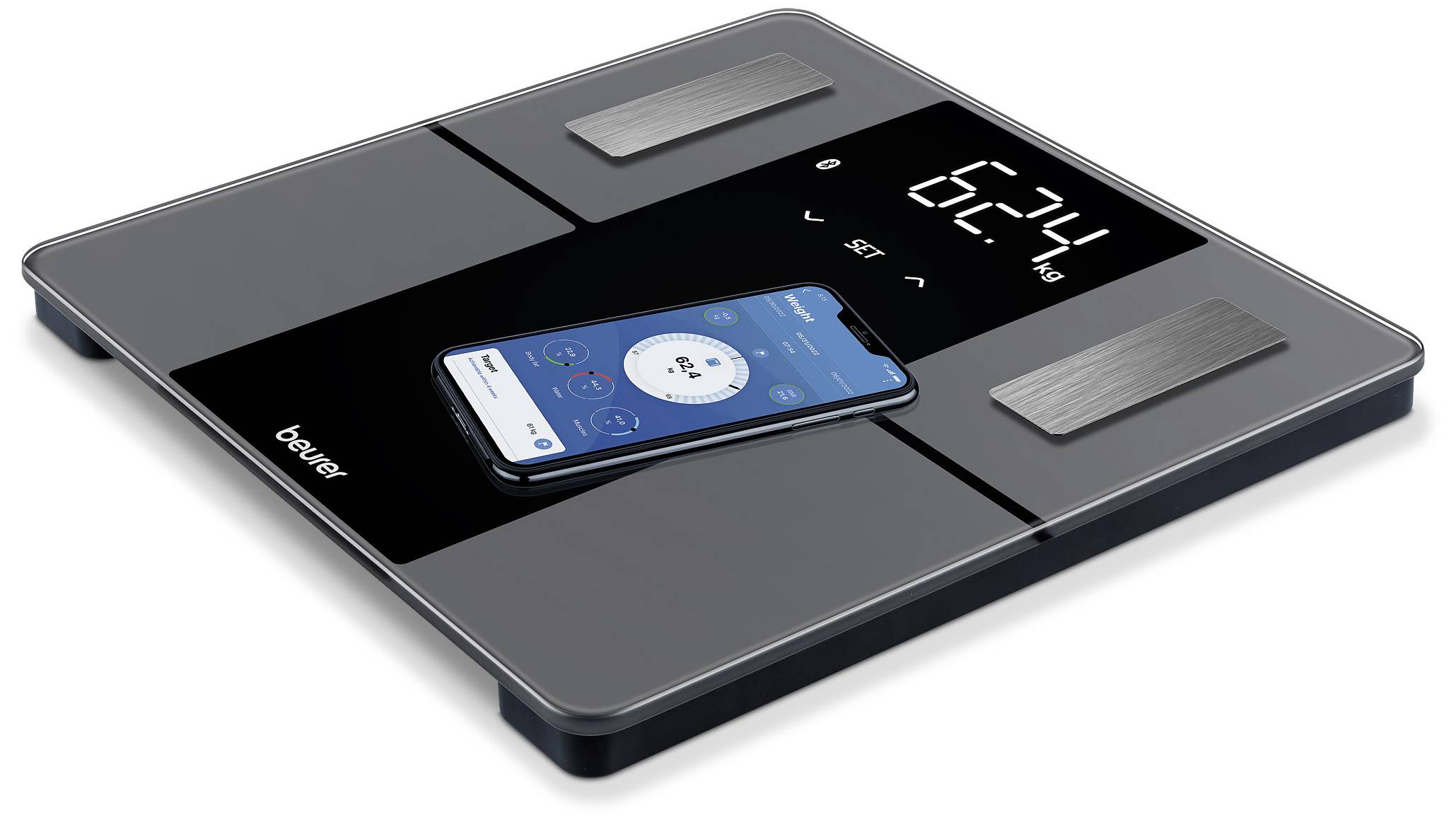 Digital personvåg med smartphone på ytan. Visar vikt 62,4 kg. Kombinerar app-teknik för hälsoövervakning.