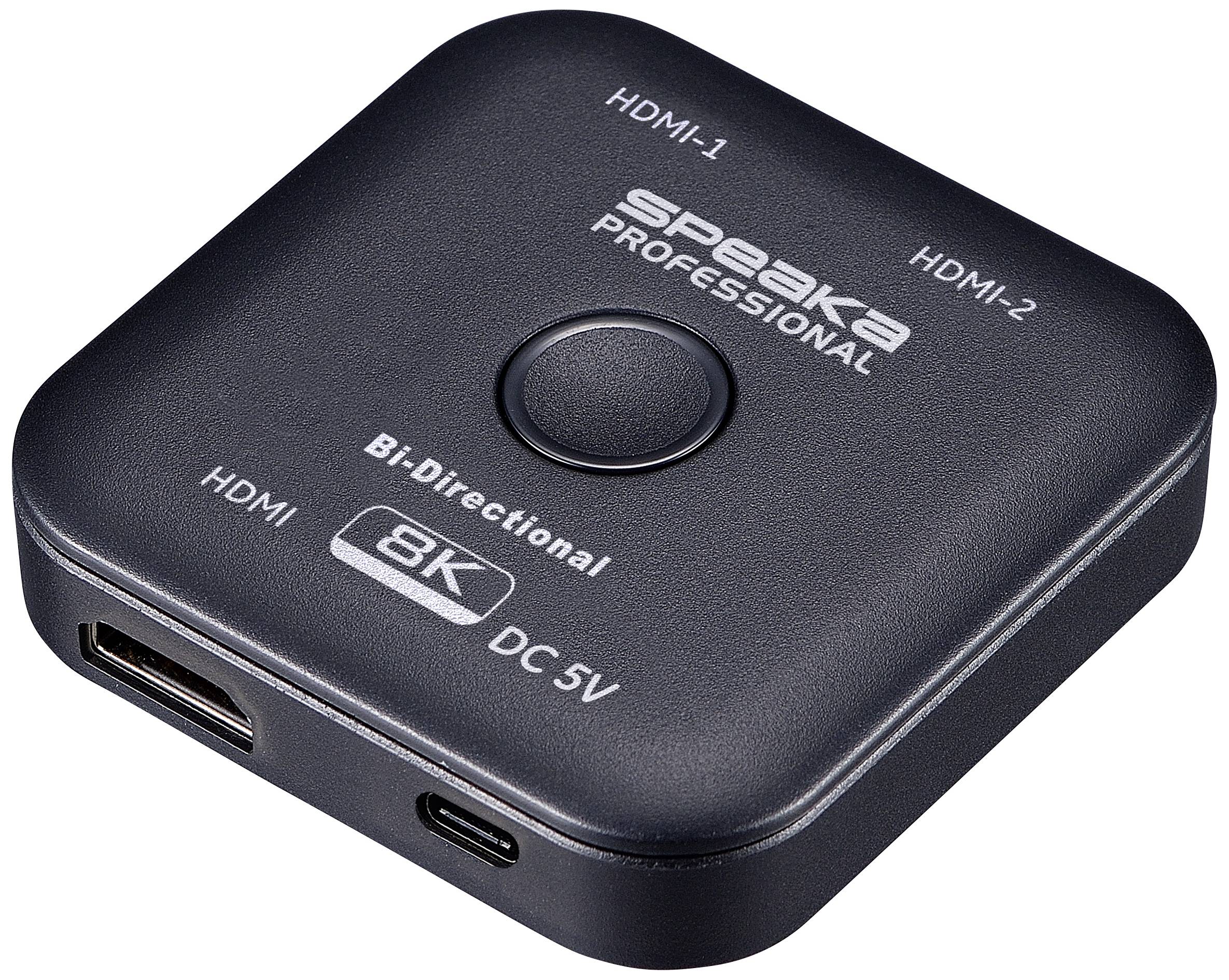 Svart HDMI-splitter, två HDMI-ingångar, en utgång. Påskrift: 'Speaka Professional', stöder 8K, 5V strömförsörjning.