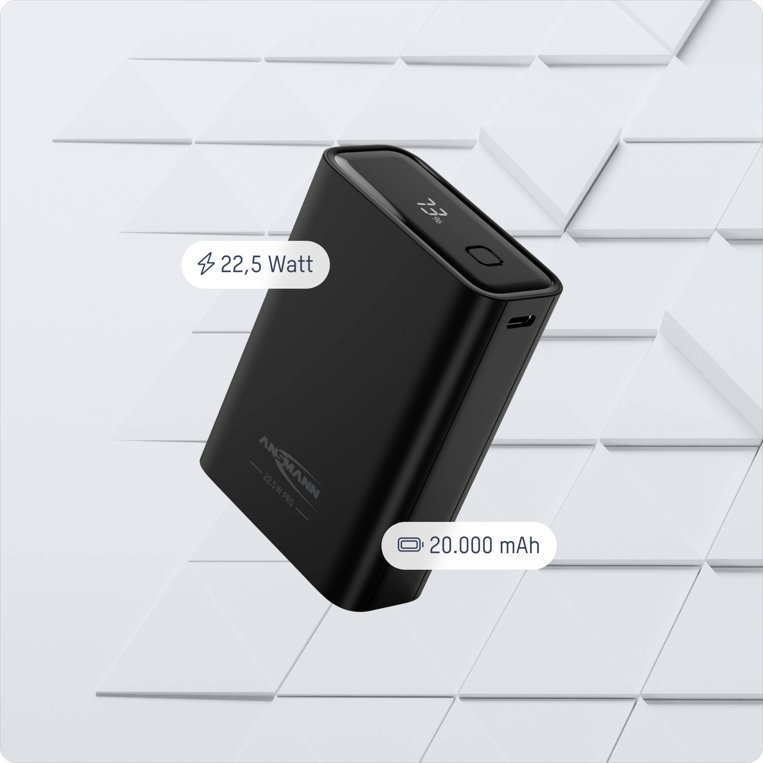 Svart powerbank med 22,5 watt och en kapacitet på 20 000 mAh, placerad på grå bakgrund med geometriskt mönster.