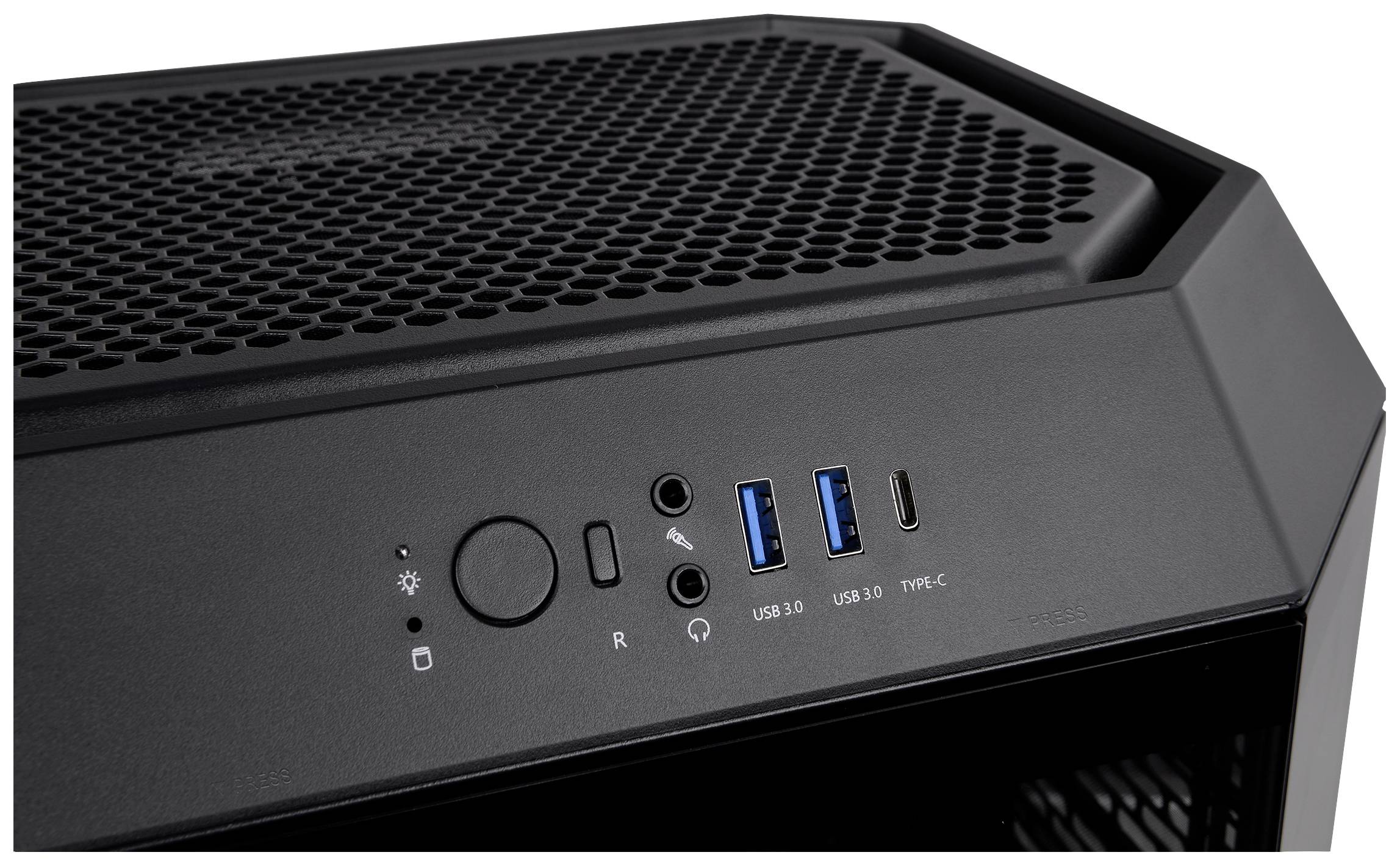 Bilden visar den övre framsidan av ett datorhölje med flera USB-portar, en på/av-knapp och ljudanslutningar.