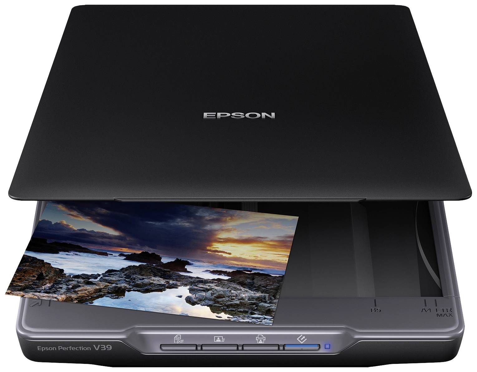 En flatbäddsscanner digitaliserar ett foto av en kustlandskap vid solnedgång. Modell: Epson Perfection V39.