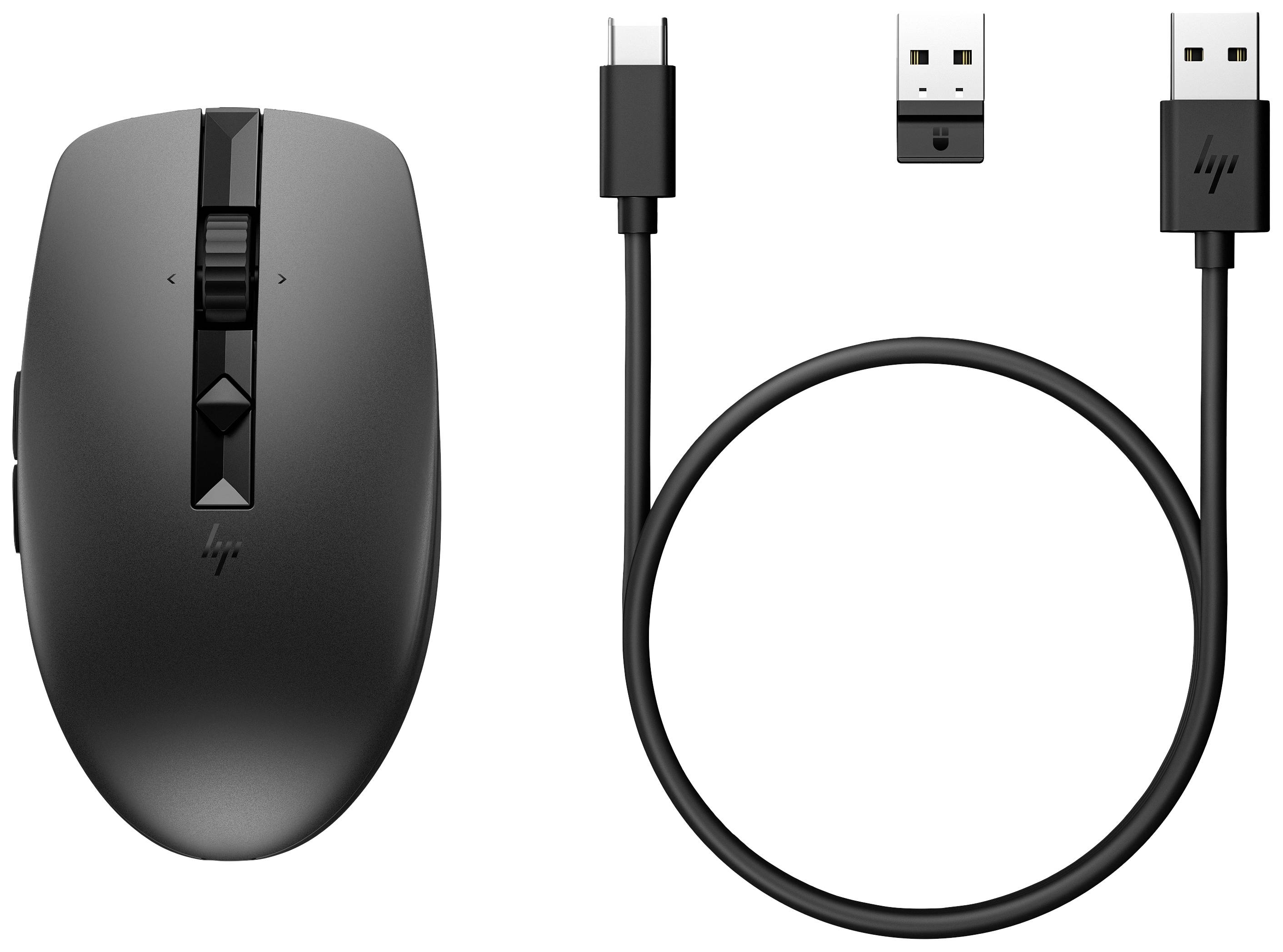 Trådlös svart mus med USB-mottagare och USB-C-laddningskabel.