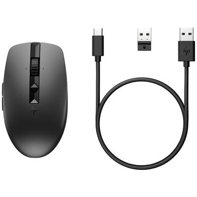Trådlös svart mus med USB-mottagare och USB-C-laddningskabel.