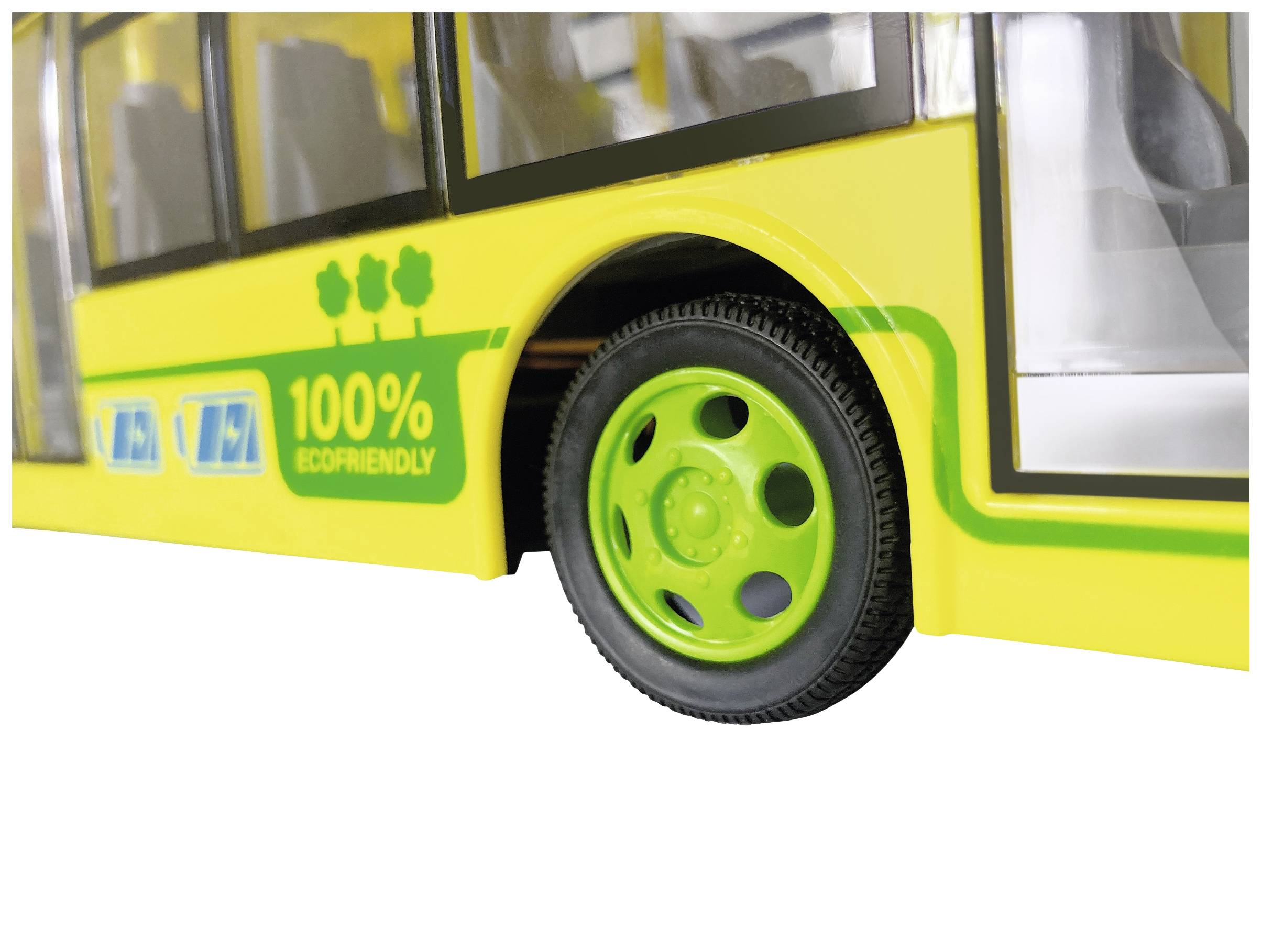 Gul buss med grön text '100% Miljövänlig' på sidan. Bilden betonar miljövänliga transportmedel.