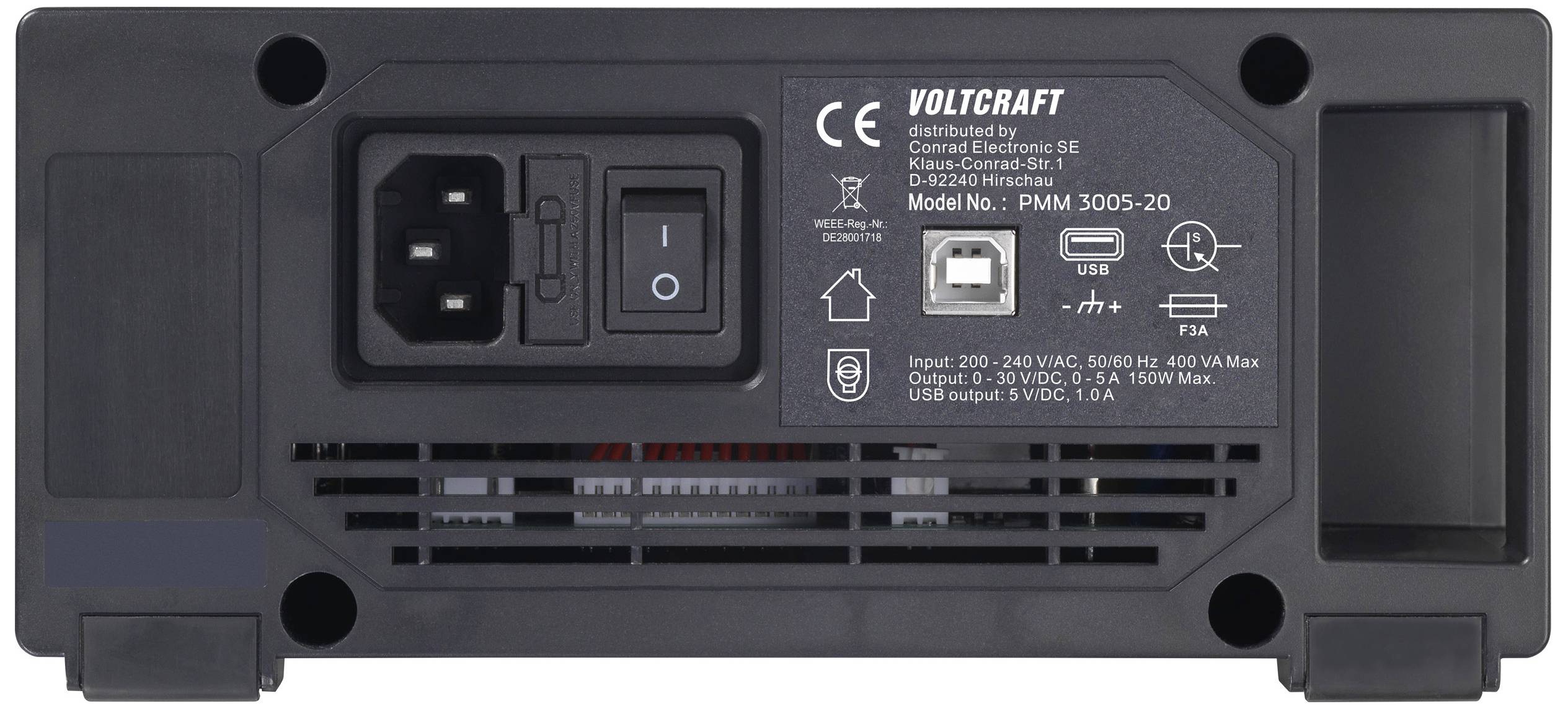 Baksidan av en nätadapter med strömingång, USB-port, nätbrytare och teknisk märkning. Märke: Voltcraft, Modell: PMM 3005-2D.